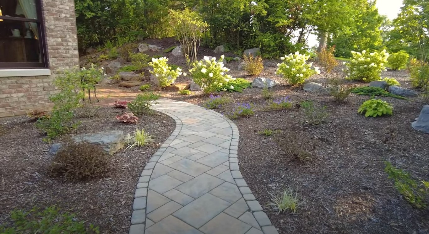 Curved paver walkway with decorative borders in Passaic, NJ